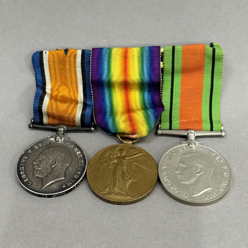 313 - First World War and Victory medals named to PTE E H St John Middlesex Regt plus Second World War def... 