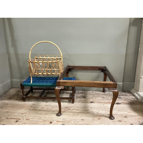 67 - A bamboo magazine rack, an oak stool with blue and green nylon seat and a large mahogany stool frame... 