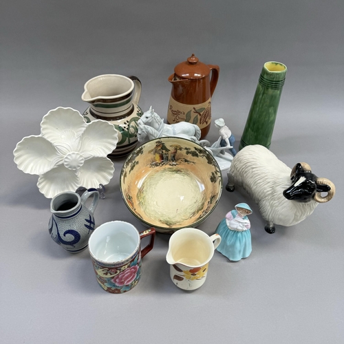 105 - A Rowntree cocoa jug, a Doulton series bowl, a green glaze tapered jug, a pottery sheep, plogh team ... 