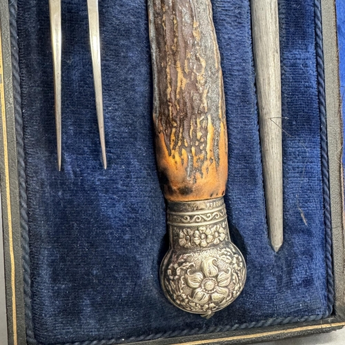 110 - A set of three antler handled carvers in fitted case, an oak stationery box with lift up lid and fal... 