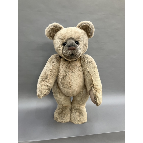 179 - A very large teddy bear by Charlie Bears with pale blonde plush and black eyes, swivel head and join... 