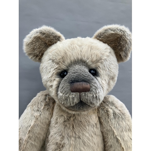 179 - A very large teddy bear by Charlie Bears with pale blonde plush and black eyes, swivel head and join... 