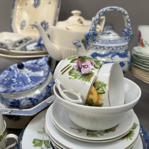 44 - A quantity of blue and white ware including cups and saucers, tea plates, dinner plates, and a Woods... 