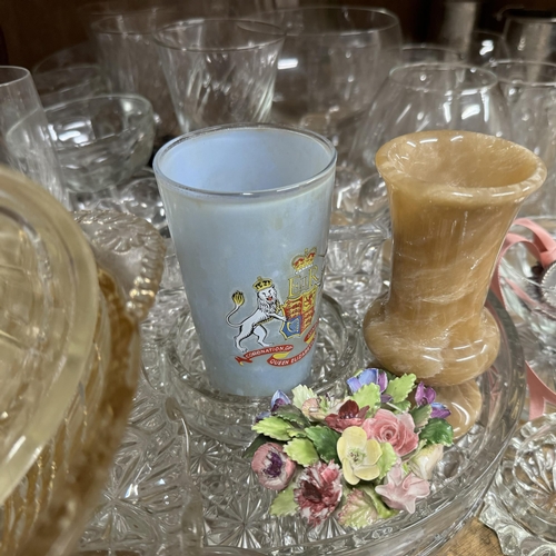 52 - A large quantity of moulded and other glass including cake stands, fruit dishes, trifle dishes, deca... 