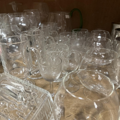 52 - A large quantity of moulded and other glass including cake stands, fruit dishes, trifle dishes, deca... 