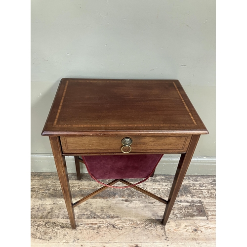 243 - An Edward VII mahogany and satinwood banded work table, rectangular, having a drawer and fabric line... 