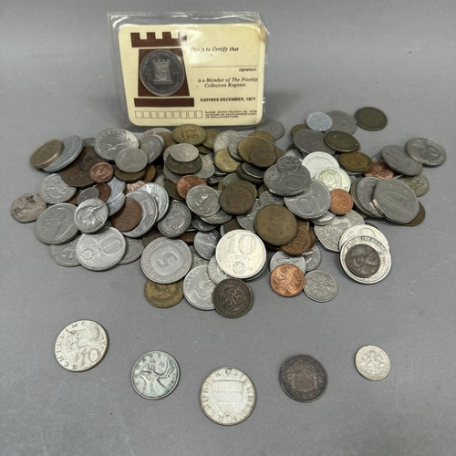 319 - Tub of mainly foreign obsolete currency plus approximate 30gms of foreign silver coins