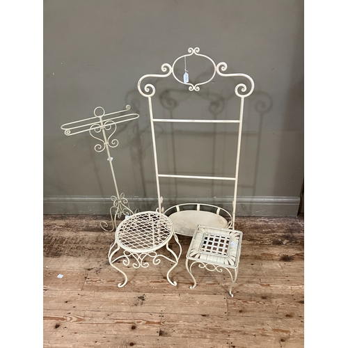 223 - Two wire work tables, one square and one circular outline together with a wire work towel rail and a... 