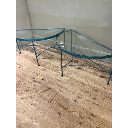 225 - A pair of conservatory green metal demi-lune conservatory tables with glass inset service and on str... 