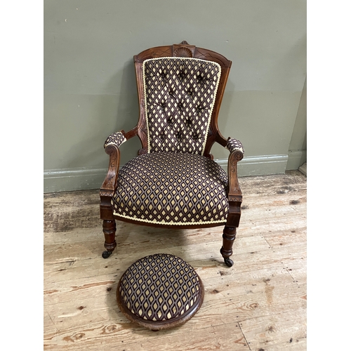 289 - A late Victorian open armchair having an encircling frame with shell cresting, button upholstered ba... 