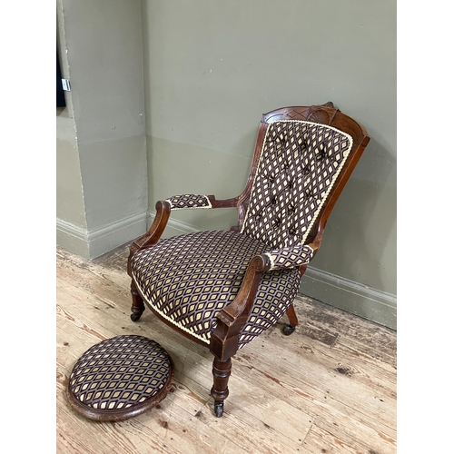 289 - A late Victorian open armchair having an encircling frame with shell cresting, button upholstered ba... 