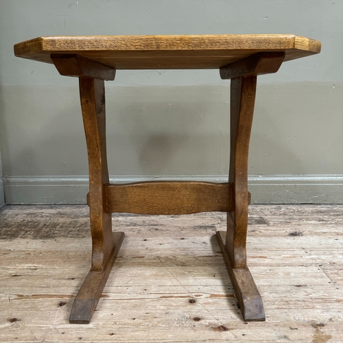 290 - A small oak refectory table on shaped standards joined by a stretcher, 70cm x 64cm x 70cm