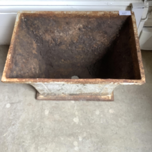 227 - A cast iron planter of rectangular outline and flared profile, 40cm x 28cm x 25cm