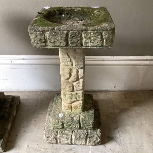 231 - A cast sun dial bird bath on two stepped square base, 30cm square x 62cm high