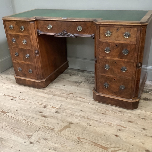 272 - A Victorian figured walnut desk converted from a dressing table having a faux leather writing surfac... 