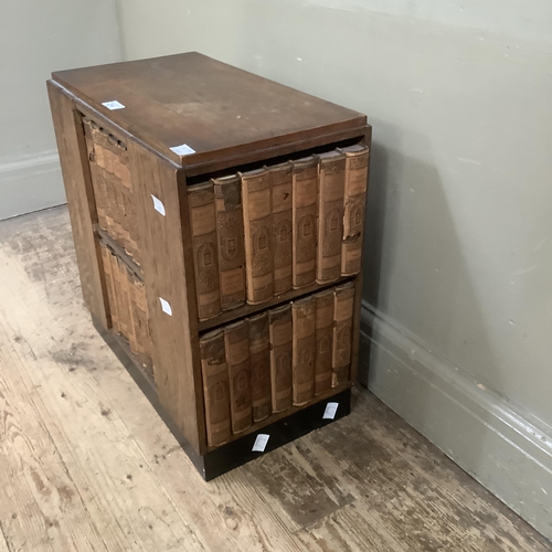 274 - An art deco oak bookcase with compartments to each side on a plinth base and holding a set of unifor... 