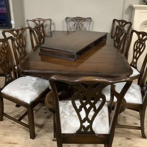 292 - A Rackstraw dining room suite comprising extending dining table on twin pedestals each with three do... 