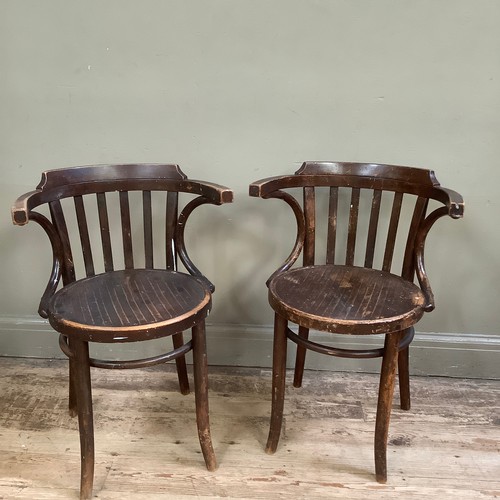 65 - A pair of bentwood armchairs of European design