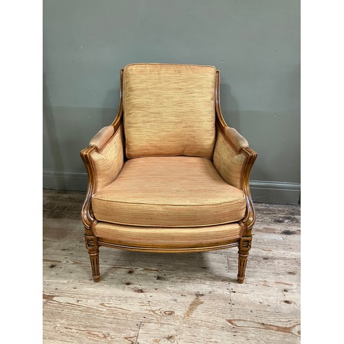 286 - An early 19th century style fruitwood and bergere caned armchair having a square back, upholstered a... 