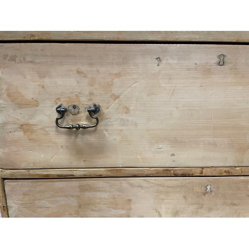 83 - A Victorian pine chest of two deep drawers with later swing handles and associated turned feet, 95cm... 