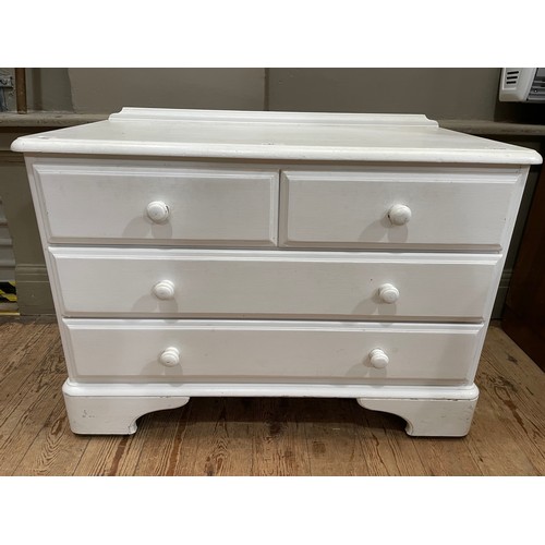 87 - A white painted, possibly pine, chest of two short over two long drawers on bracket feet, 88cm x 45c... 