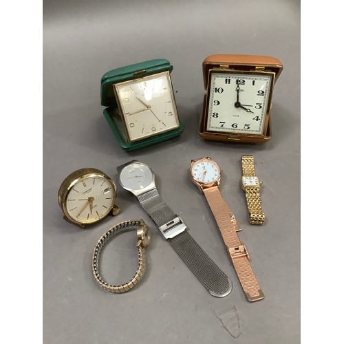 208 - A collection of wristwatches and travel clocks by makers including Oris, Smith, Looping, Skagen and ... 