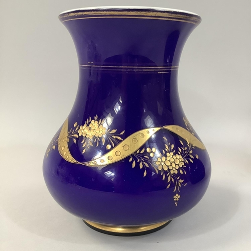 217 - A CONTINENTAL COBALT BLUE AND GILT VASE, the baluster body etched and gilt with a band of entwined r... 