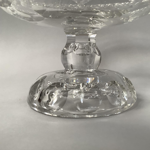 218 - A PAIR OF MID 18TH CENTURY IRISH GLASS PEDESTAL BOWLS, circular with petal edges and disc cut centre... 