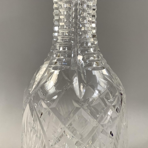 220 - A WATERFORD CUT GLASS DECANTER AND STOPPER OF MALLET-SHAPE, mark to underside, 33cm high