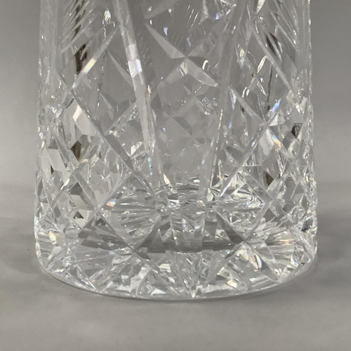 220 - A WATERFORD CUT GLASS DECANTER AND STOPPER OF MALLET-SHAPE, mark to underside, 33cm high