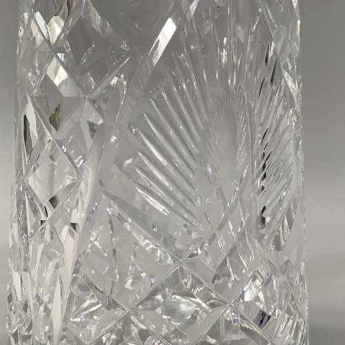 220 - A WATERFORD CUT GLASS DECANTER AND STOPPER OF MALLET-SHAPE, mark to underside, 33cm high