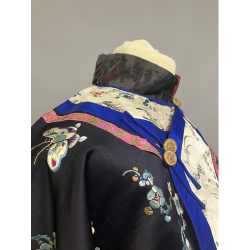 287 - AN ANTIQUE CHINESE EMBROIDERED SILK JACKET, Ru, closure to the right, the body of the Ru embroidered... 