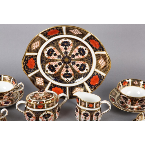 275 - A ROYAL CROWN DERBY COMPOSITE TEA SERVICE OF IMARI PALETTE, pattern 1128, comprising six cups and sa... 