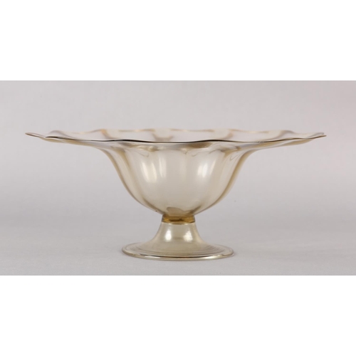 212 - A 19TH CENTURY MURANO PALE AMBER PEDESTAL BOWL, having a wavy everted rim of scalloped outline, on a... 