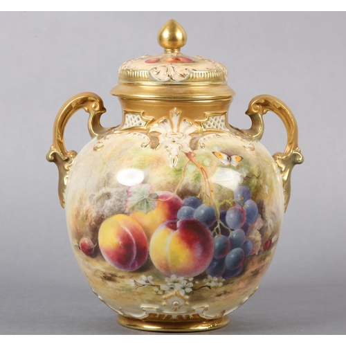 237 - A ROYAL WORCESTER PORCELAIN TWO-HANDLED VASE AND COVER BY WILLIAM RICKETTS, painted with peaches, gr... 