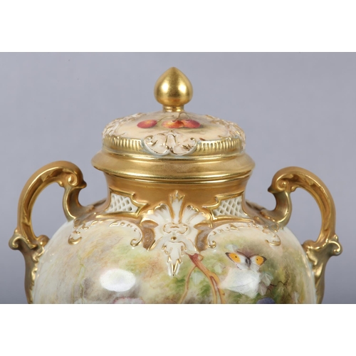 237 - A ROYAL WORCESTER PORCELAIN TWO-HANDLED VASE AND COVER BY WILLIAM RICKETTS, painted with peaches, gr... 