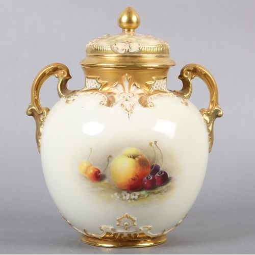 237 - A ROYAL WORCESTER PORCELAIN TWO-HANDLED VASE AND COVER BY WILLIAM RICKETTS, painted with peaches, gr... 