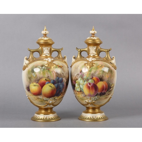 238 - A PAIR OF ROYAL WORCESTER PORCELAIN TWO-HANDLED VASES AND COVERS BY WILLIAM RICKETTS, the ovoid body... 