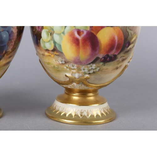 238 - A PAIR OF ROYAL WORCESTER PORCELAIN TWO-HANDLED VASES AND COVERS BY WILLIAM RICKETTS, the ovoid body... 