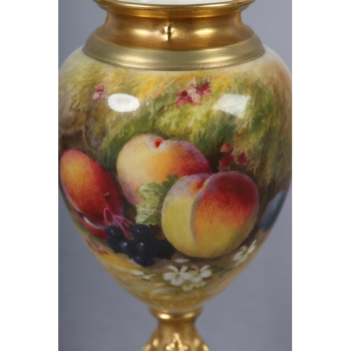 241 - A ROYAL WORCESTER PORCELAIN PEDESTAL VASE BY WILLIAM RICKETTS, painted with peaches, blueberries and... 