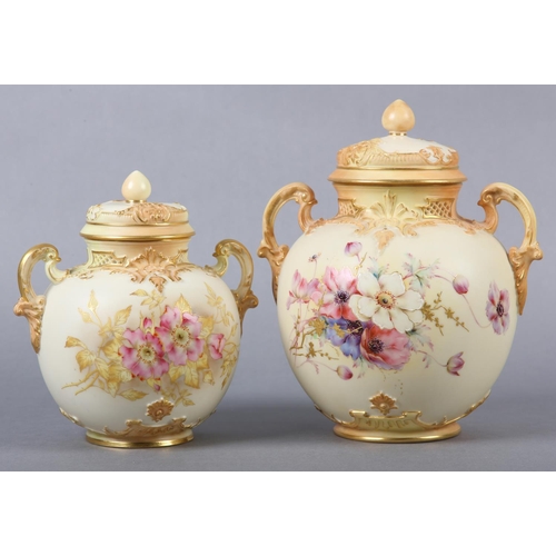 262 - A ROYAL WORCESTER BLUSH IVORY VASE and cover, having twin moulded handles, the ovoid body enamelled ... 