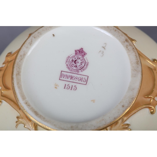 262 - A ROYAL WORCESTER BLUSH IVORY VASE and cover, having twin moulded handles, the ovoid body enamelled ... 