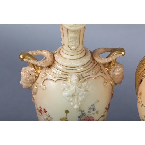 263 - THREE ROYAL WORCESTER BLUSH IVORY VASES one having a pierced cover with finial, the ovoid body ename... 