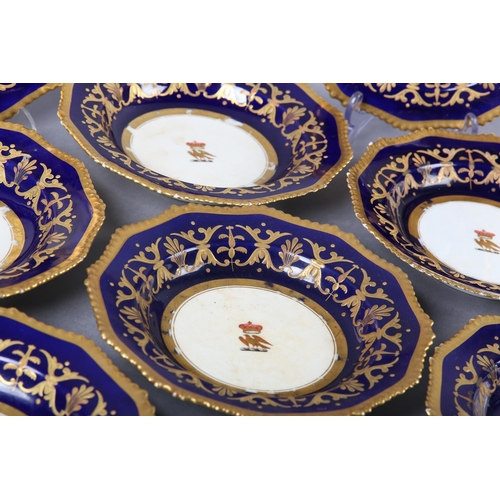 268 - A 19TH CENTURY BLOOR DERBY PART DESSERT SERVICE comprising eight plates, in cobalt blue and gilt wit... 