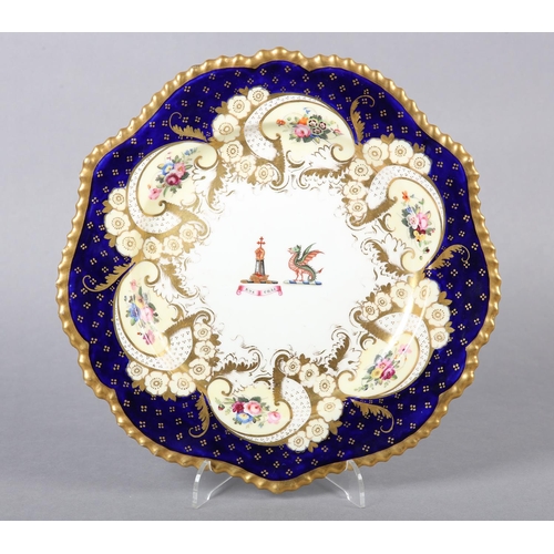 269 - A 19TH CENTURY CHAMBERLAIN’S WORCESTER ARMORIAL PLATE, bordered in cobalt blue, and gilt with sprays... 