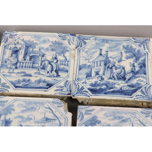 277 - A COLLECTION OF 18TH CENTURY DELFT BLUE AND WHITE TILES, variously painted with figures camped on th... 