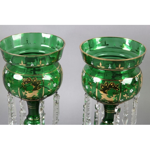 214 - A PAIR OF 19TH CENTURY BOHEMIAN GLASS LUSTRES with gilt decoration to the bowl, with hanging prismat... 