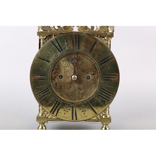 228 - A 18TH CENTURY STYLE FOUR POST BRASS LANTERN CLOCK, two train movement striking on a strap mounted b... 