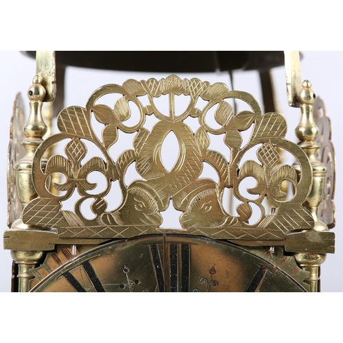 228 - A 18TH CENTURY STYLE FOUR POST BRASS LANTERN CLOCK, two train movement striking on a strap mounted b... 