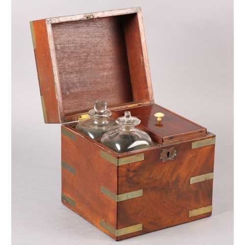 208 - A LATE 18TH CENTURY/EARLY 19TH CENTURY IRISH FIGURED MAHOGANY AND BRASS BOUND DECANTER BOX, label fo... 